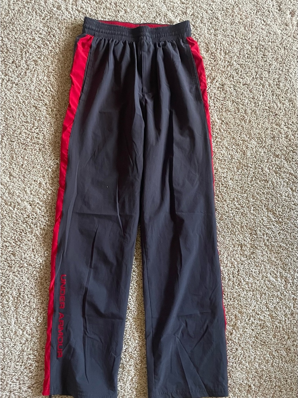 Under Armour Black Track Pants with Red Side Panels